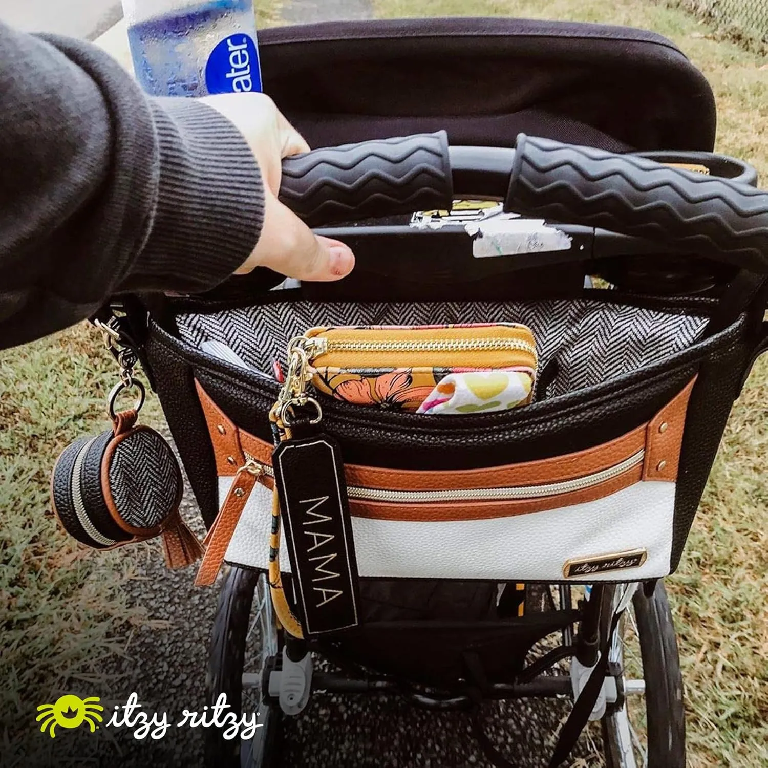 Itzy Ritzy Adjustable Stroller Caddy / Organizer - Stroller Organizer Bag Featuring Front Zippered Pocket, 2 Built-In Interior Pockets & Adjustable Straps to Fit Nearly Any Stroller (Coffee and Cream)